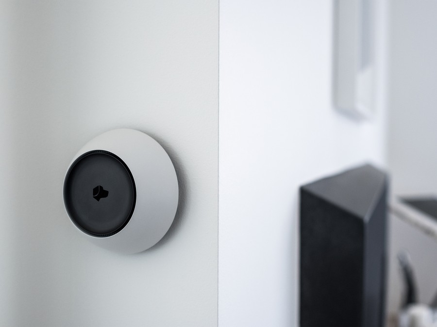 A Josh.ai voice device mounted on the wall. 